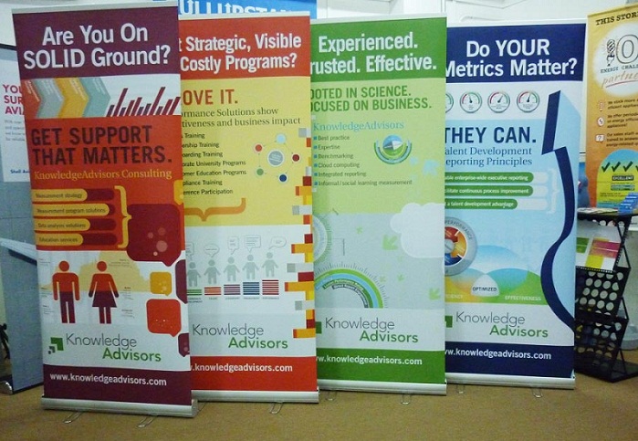 Double sided pull up banner