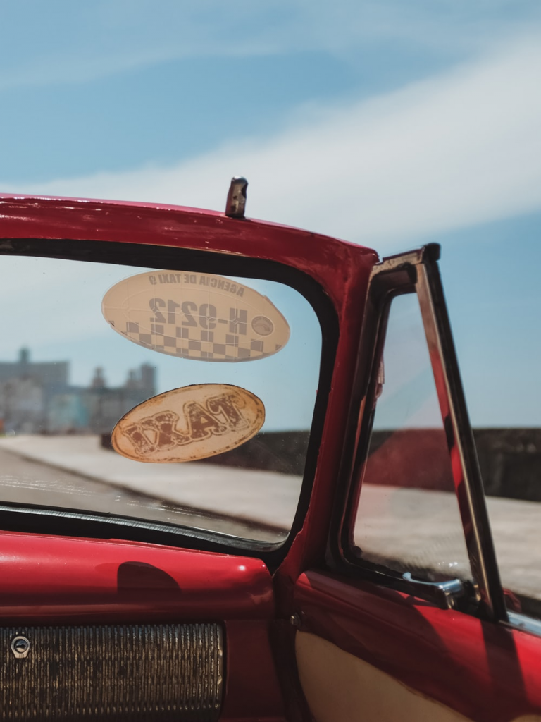 Oval car magnets on a car-s windshield