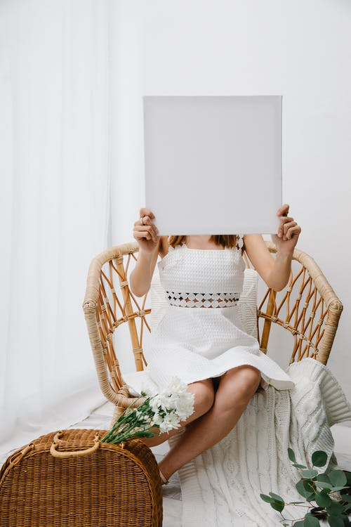 A woman displaying canvas 