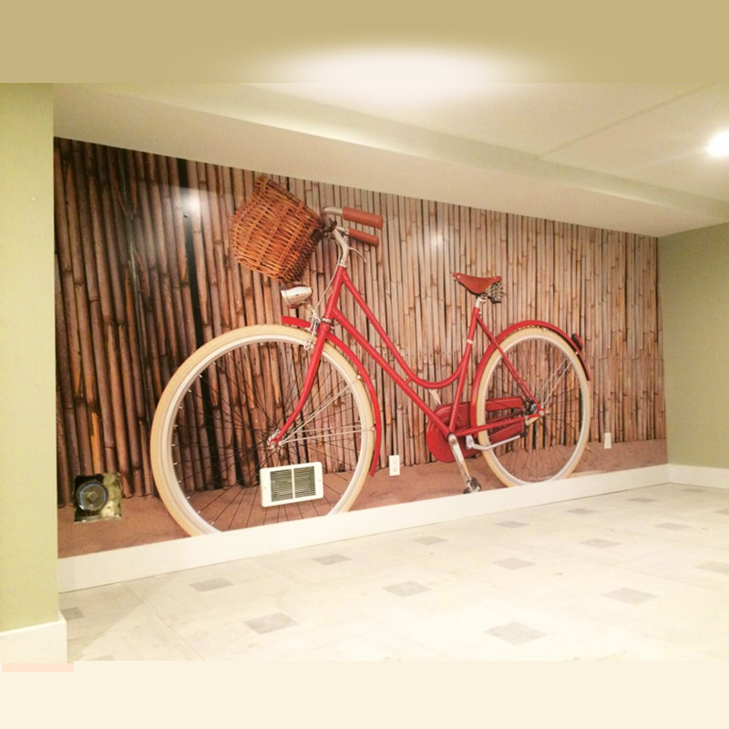 Self-adhesive vinyl featuring a vibrant graphic of a bicycle