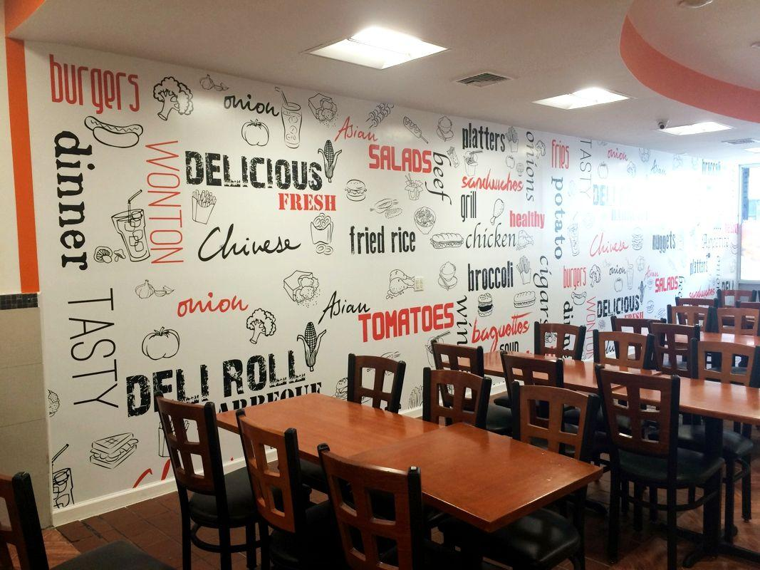 A diner with a beautifully printed wall covering