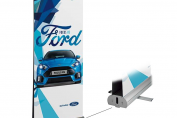 Double-sided retractable banner used for enhancing trade show pop-up displays