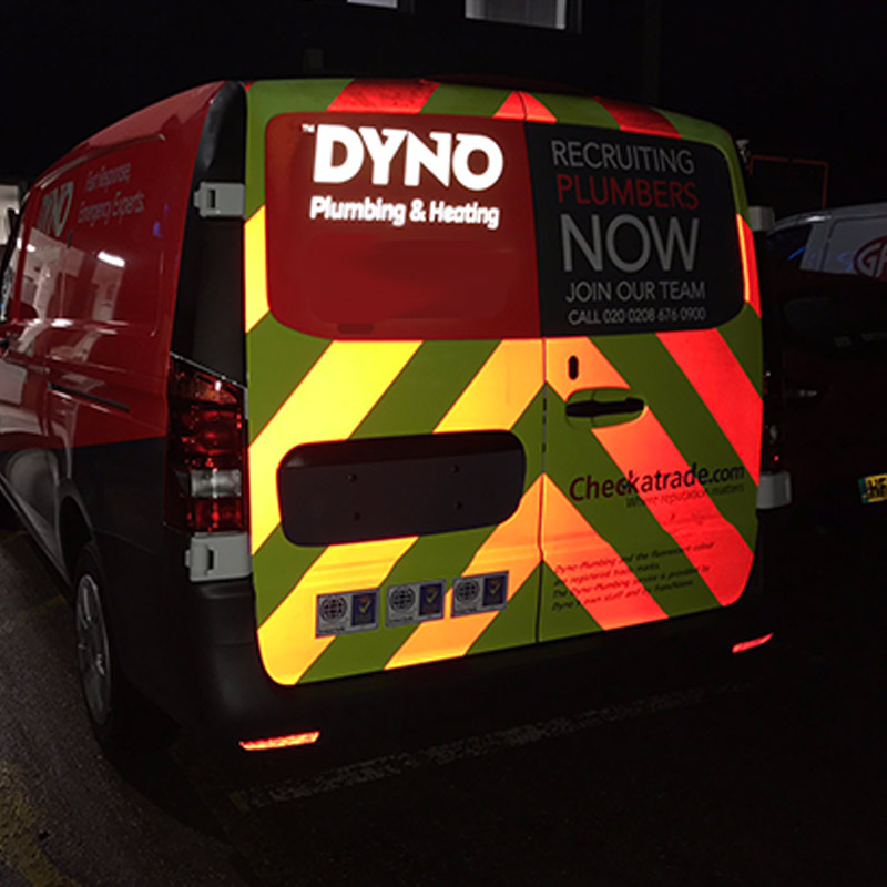 Vehicle with a reflective vinyl wrap printed through large format printing