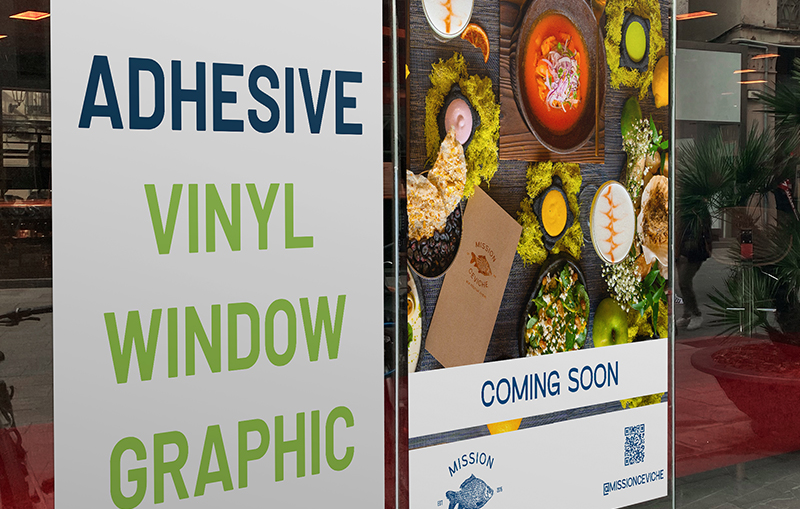 Self-adhesive vinyl high-quality printed banner displayed on a glass storefront window