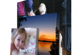 Canvas wrapped paintings of children and a sunset