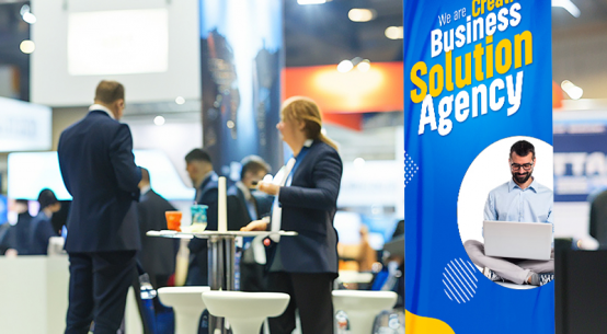Retractable trade show banner using oversized headline typography and strong color contrast