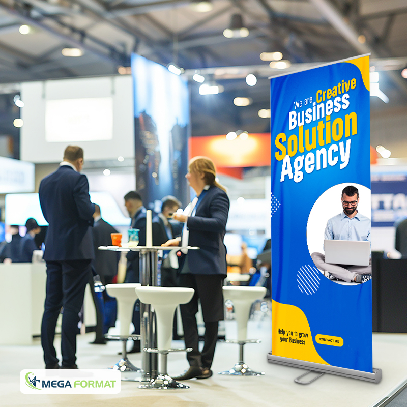 Retractable trade show banner using oversized headline typography and strong color contrast