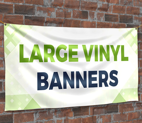 Large horizontal vinyl banner installed on a brick wall with corner grommets