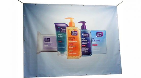 Trade show banner and display graphics for a branded exhibition booth