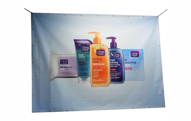 Trade show banner and display graphics for a branded exhibition booth